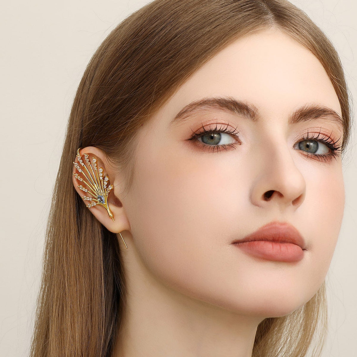 Ethereal Fountain ear cuff worn on the ear, profile view