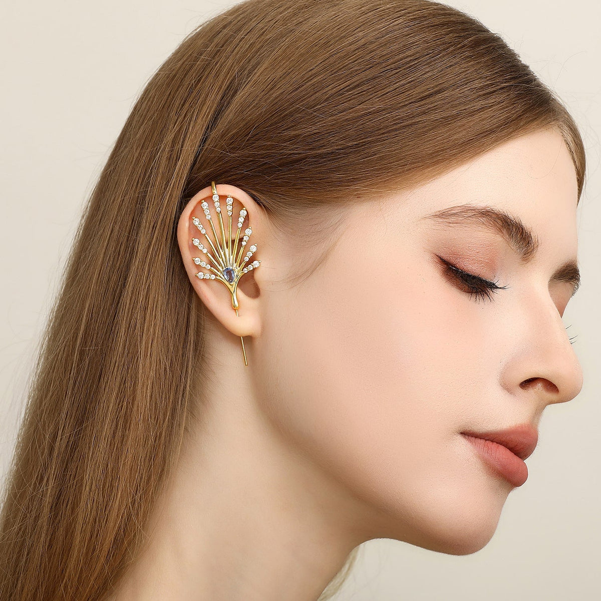 Ethereal Fountain ear cuff worn on the ear, profile view