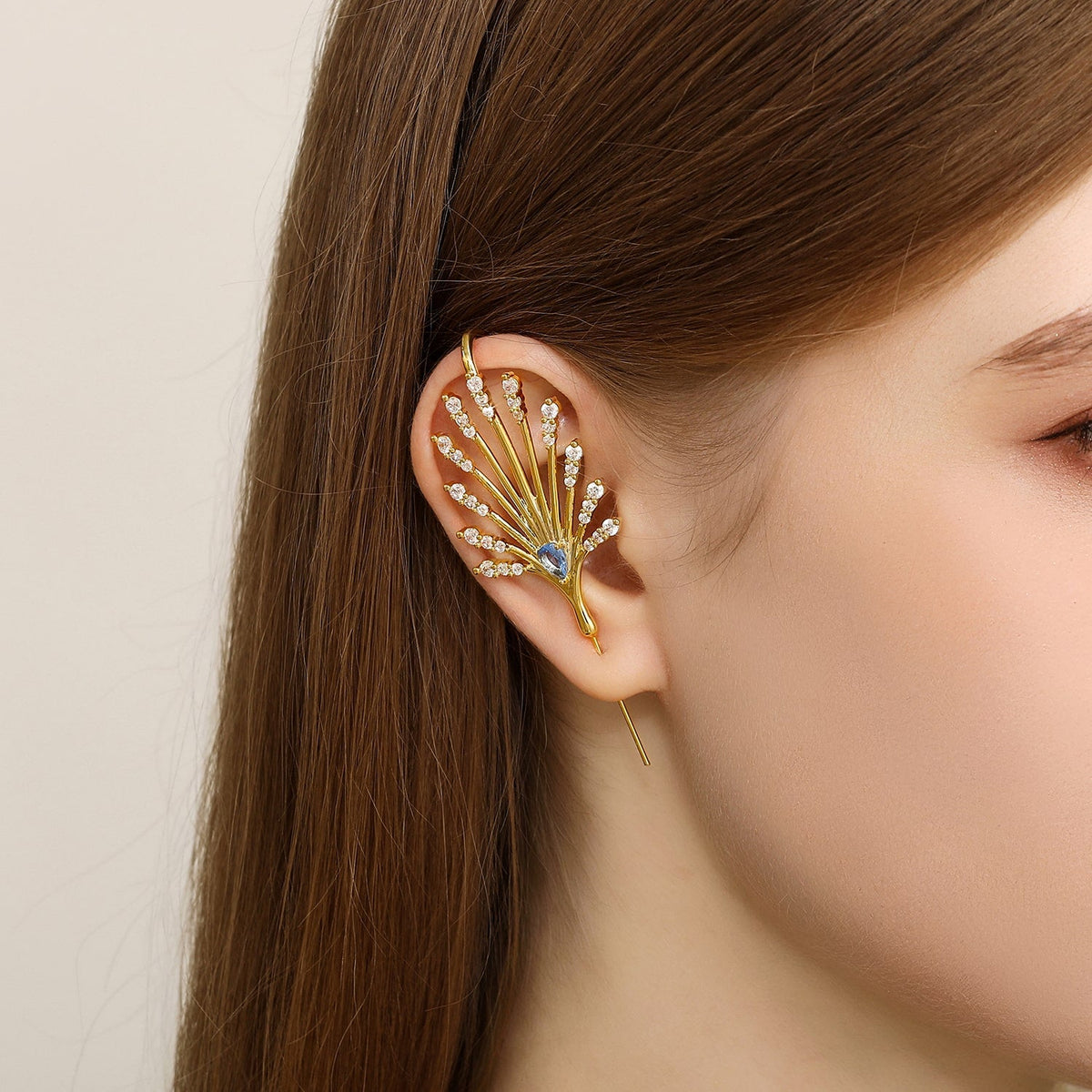 Ethereal Fountain ear cuff worn on the ear, profile view