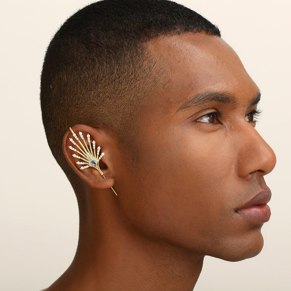 Ethereal Fountain ear cuff worn on the ear, profile view