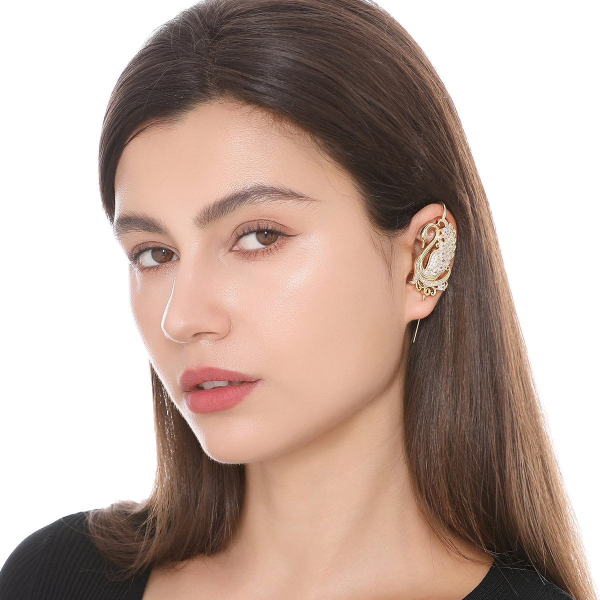 Graceful Swan ear cuff worn on the ear, profile view