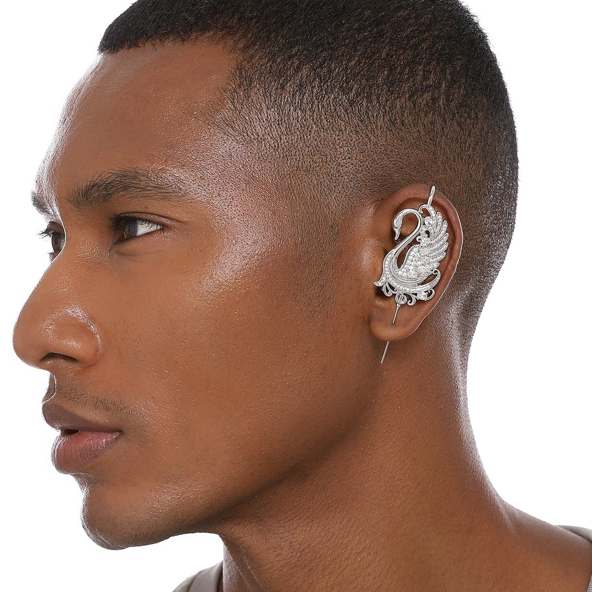 Graceful Swan ear cuff worn on the ear, profile view