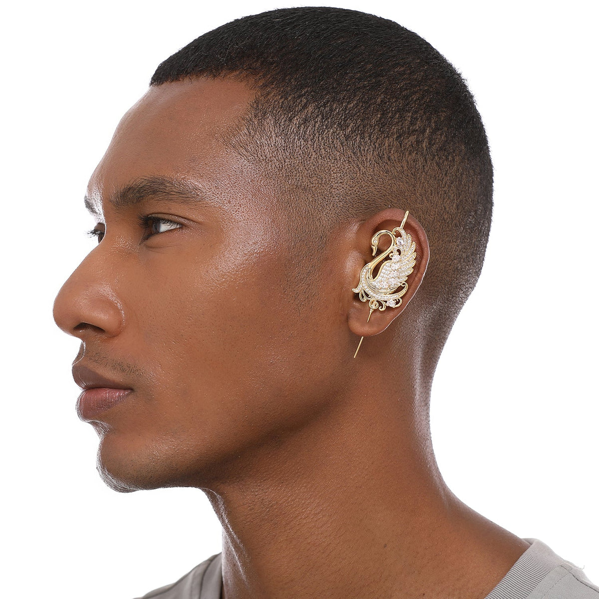 Graceful Swan ear cuff worn on the ear, profile view