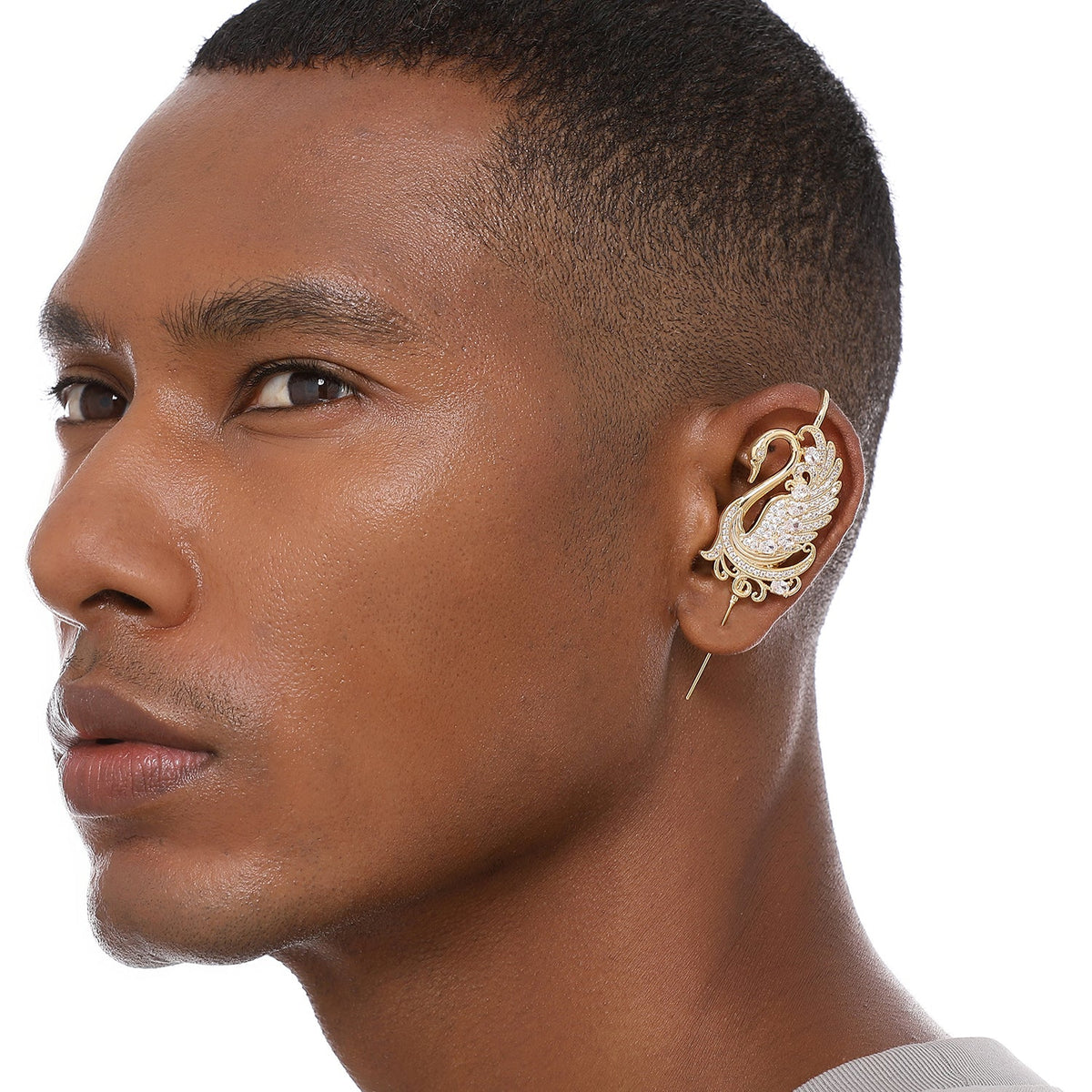 Graceful Swan ear cuff worn on the ear, profile view