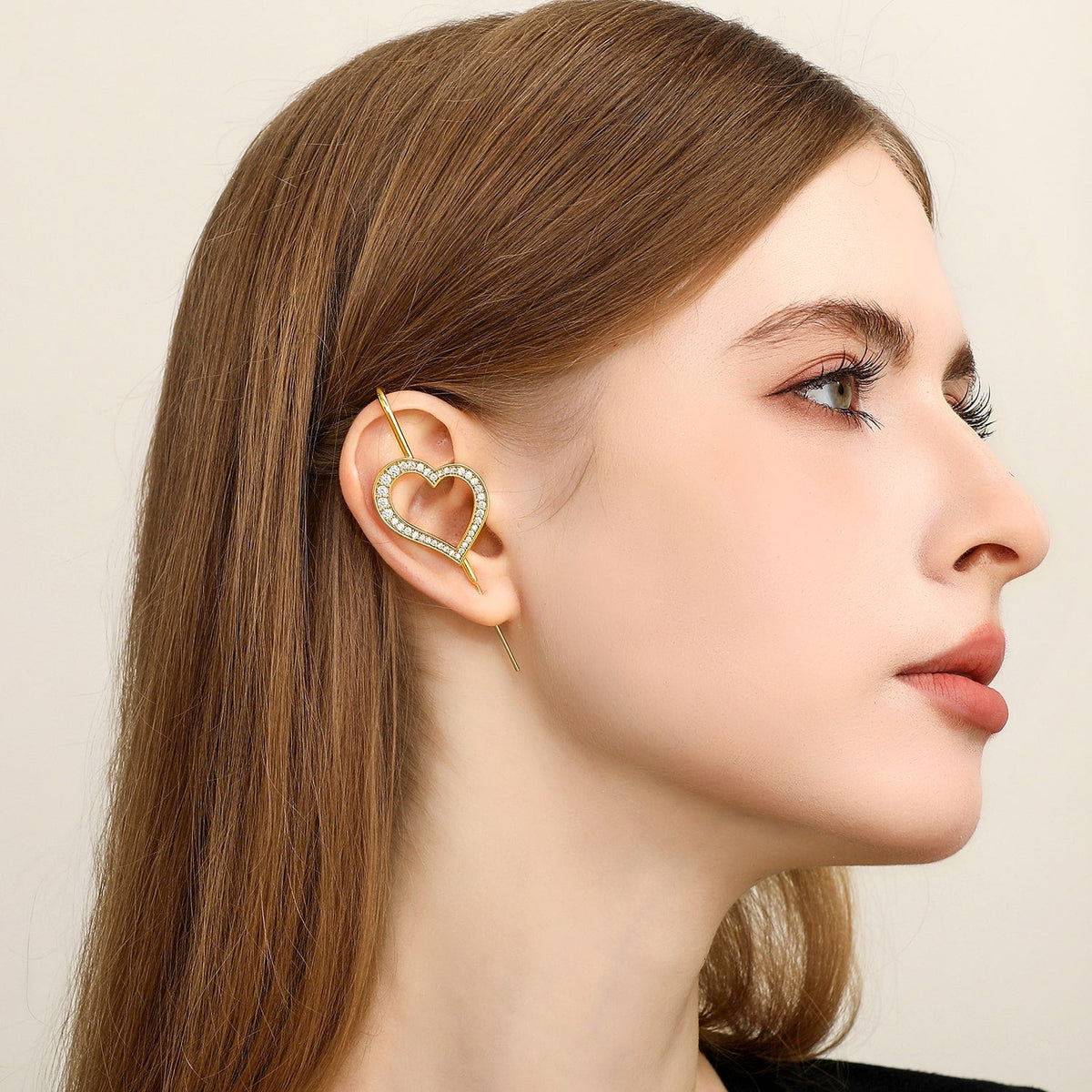 Pure Heart ear cuff worn on the ear, profile view