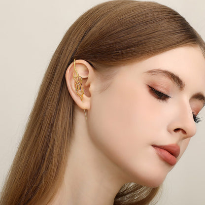 Inner Fire ear cuff worn on the ear, profile view