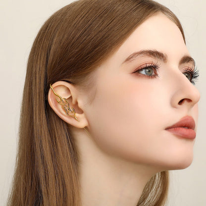 Inner Fire ear cuff worn on the ear, profile view