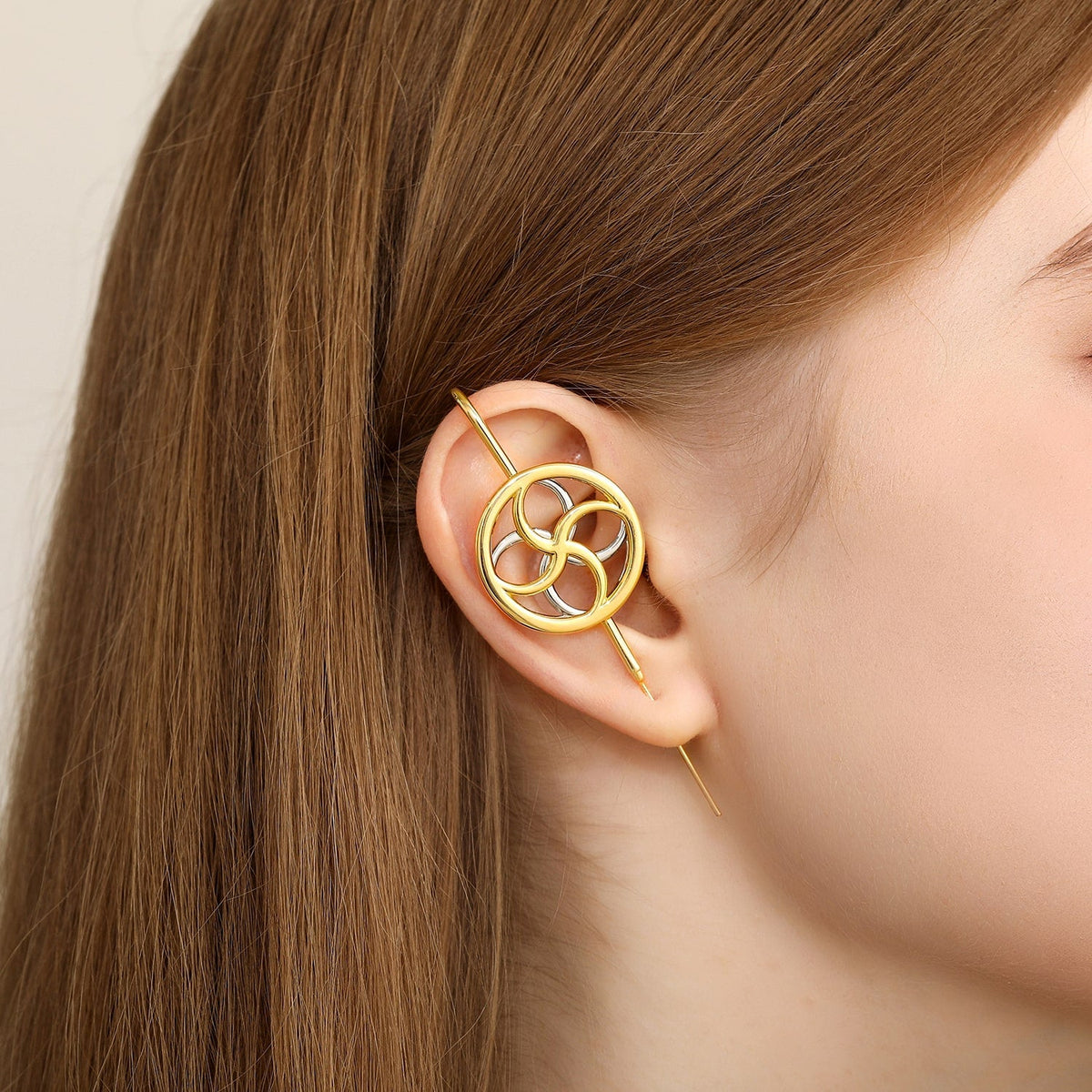 Kinetic Loop ear cuff worn on the ear, profile view