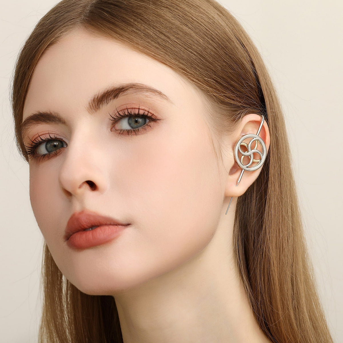 Kinetic Loop ear cuff worn on the ear, profile view
