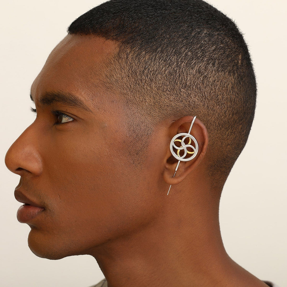 Kinetic Loop ear cuff worn on the ear, profile view