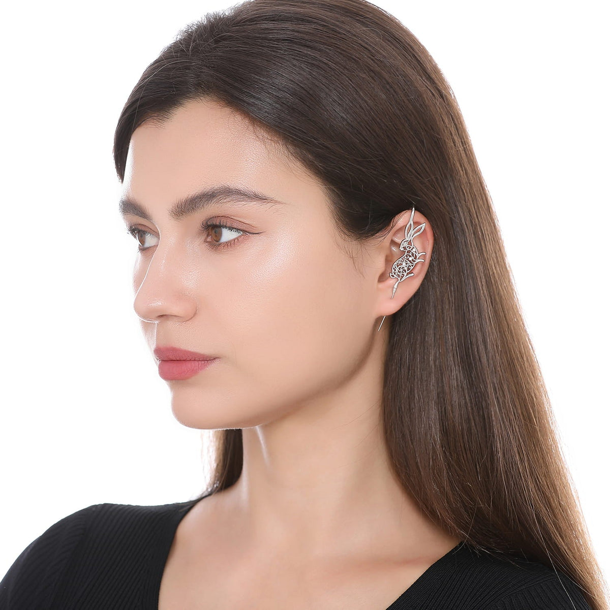 Leaping Hare ear cuff worn on the ear, profile view