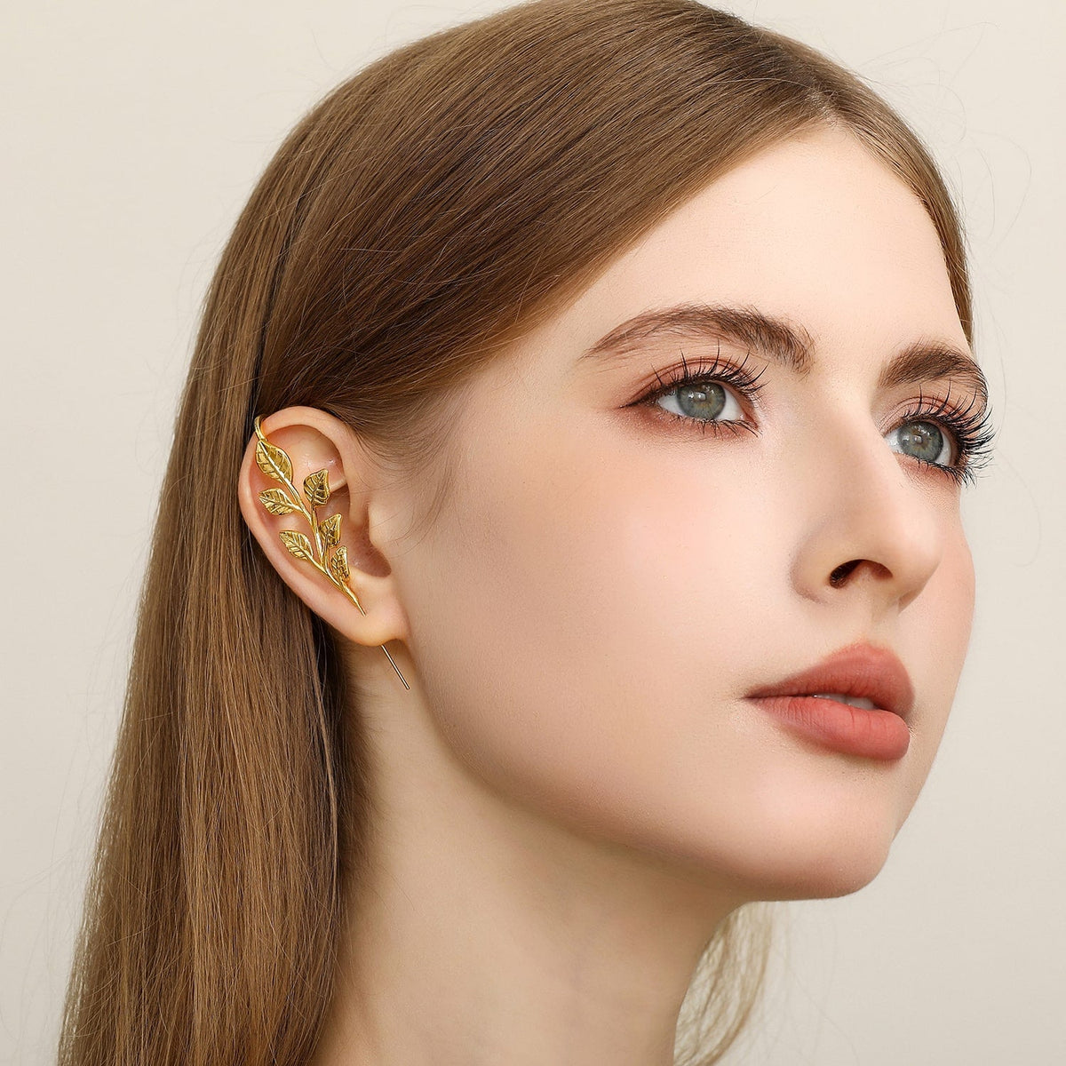 Whispering Leaves ear cuff worn on the ear, profile view