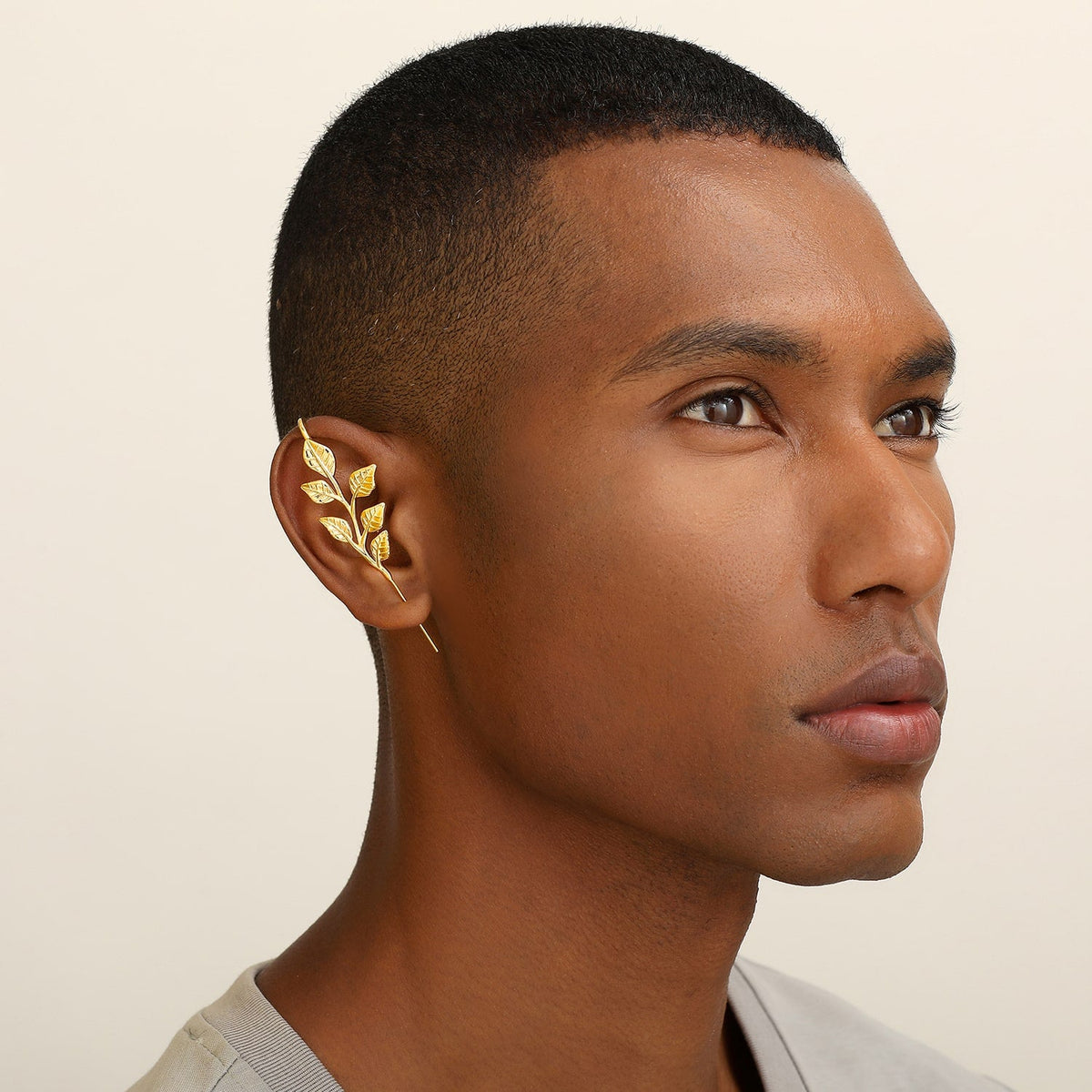 Whispering Leaves ear cuff worn on the ear, profile view