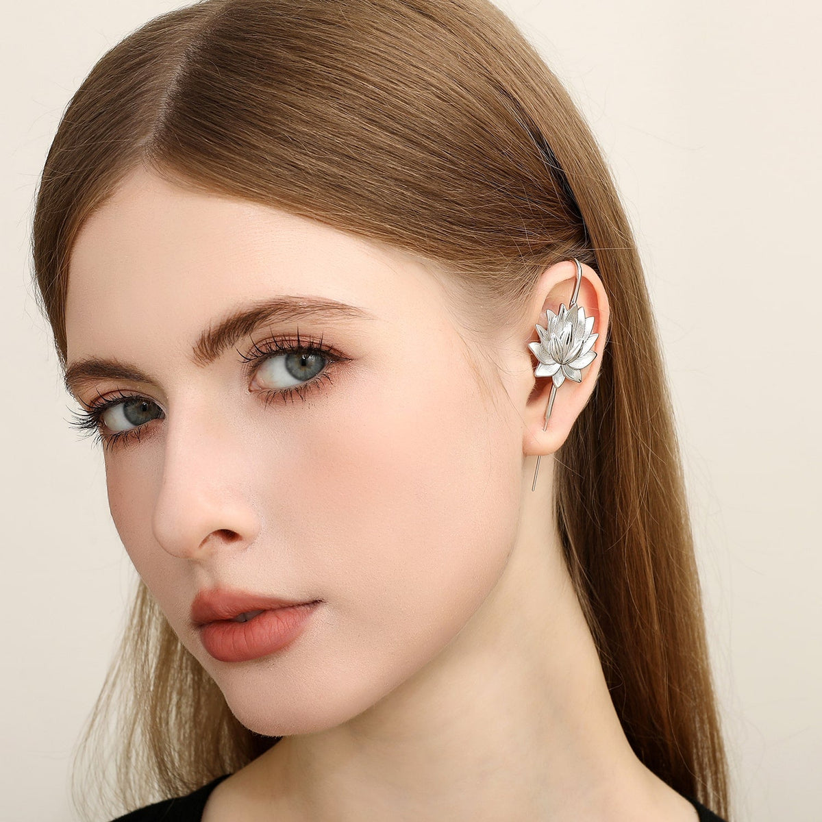 Lotus Bloom ear cuff worn on the ear, profile view