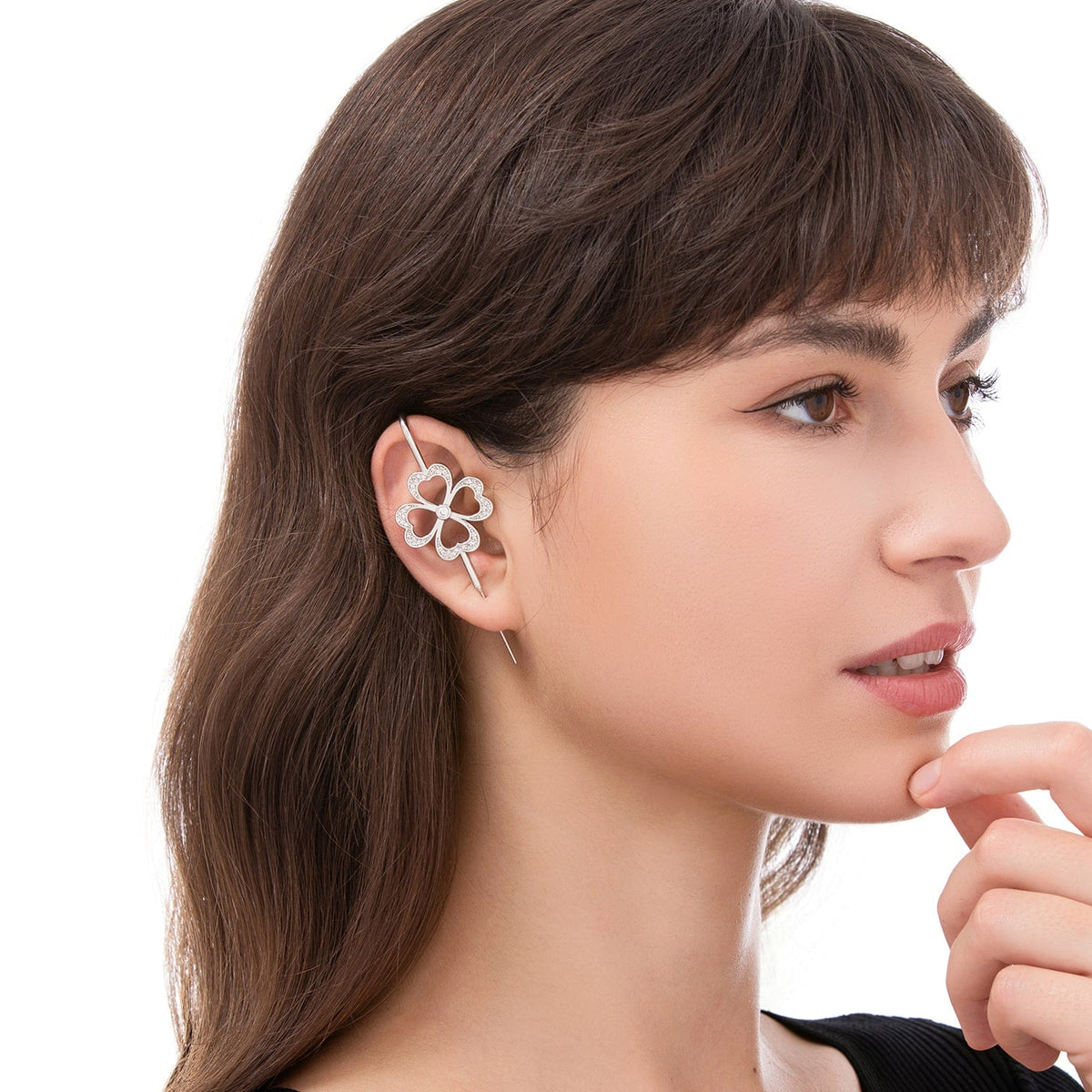 Lucky Clover ear cuff worn on the ear, profile view