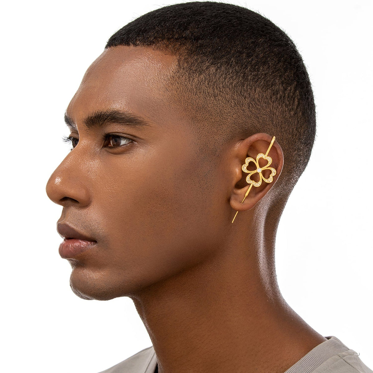 Lucky Clover ear cuff worn on the ear, profile view