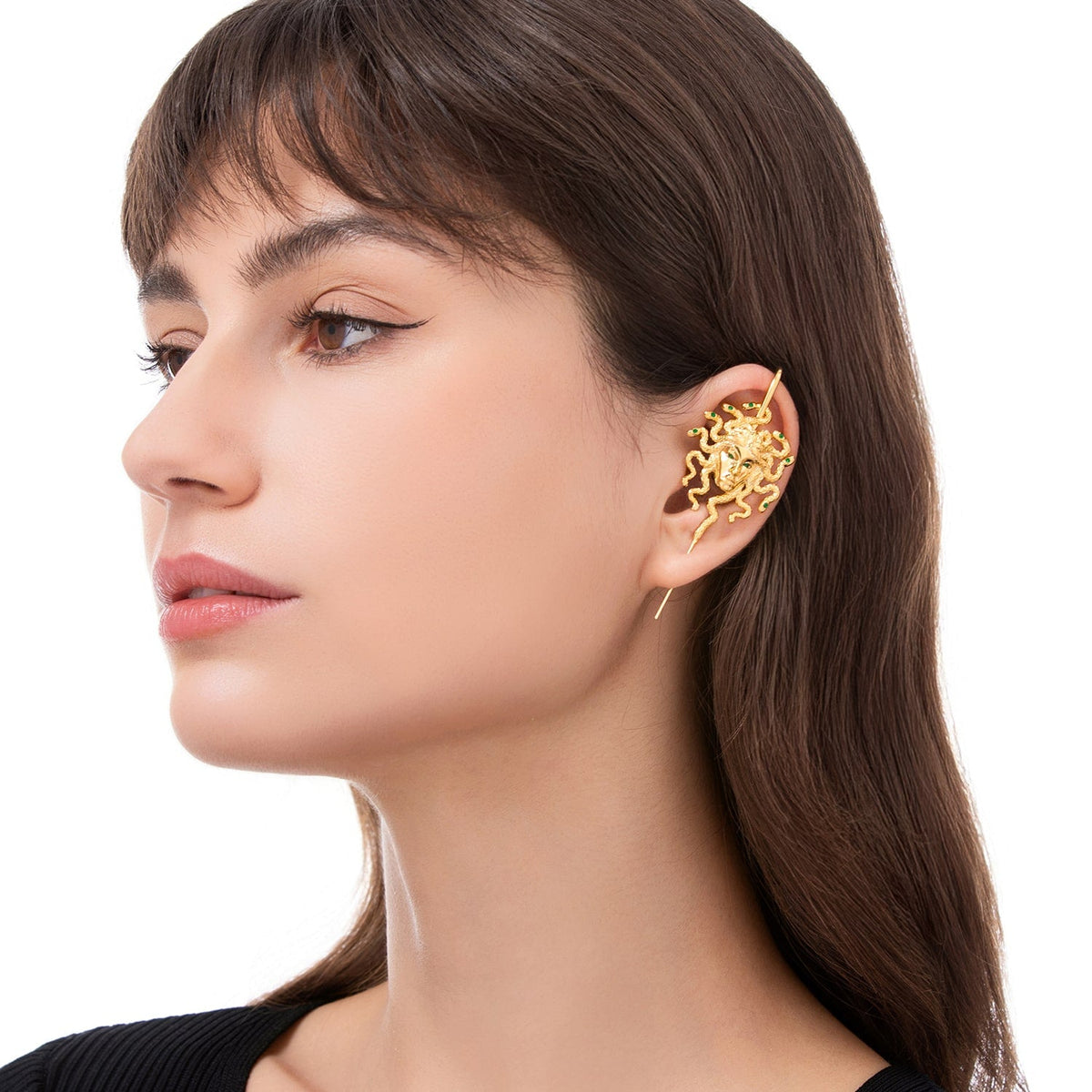 Medusa's Gaze ear cuff worn on the ear, profile view