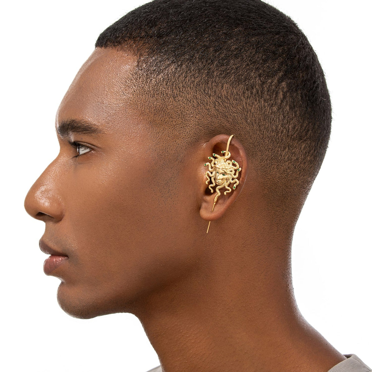 Medusa's Gaze ear cuff worn on the ear, profile view
