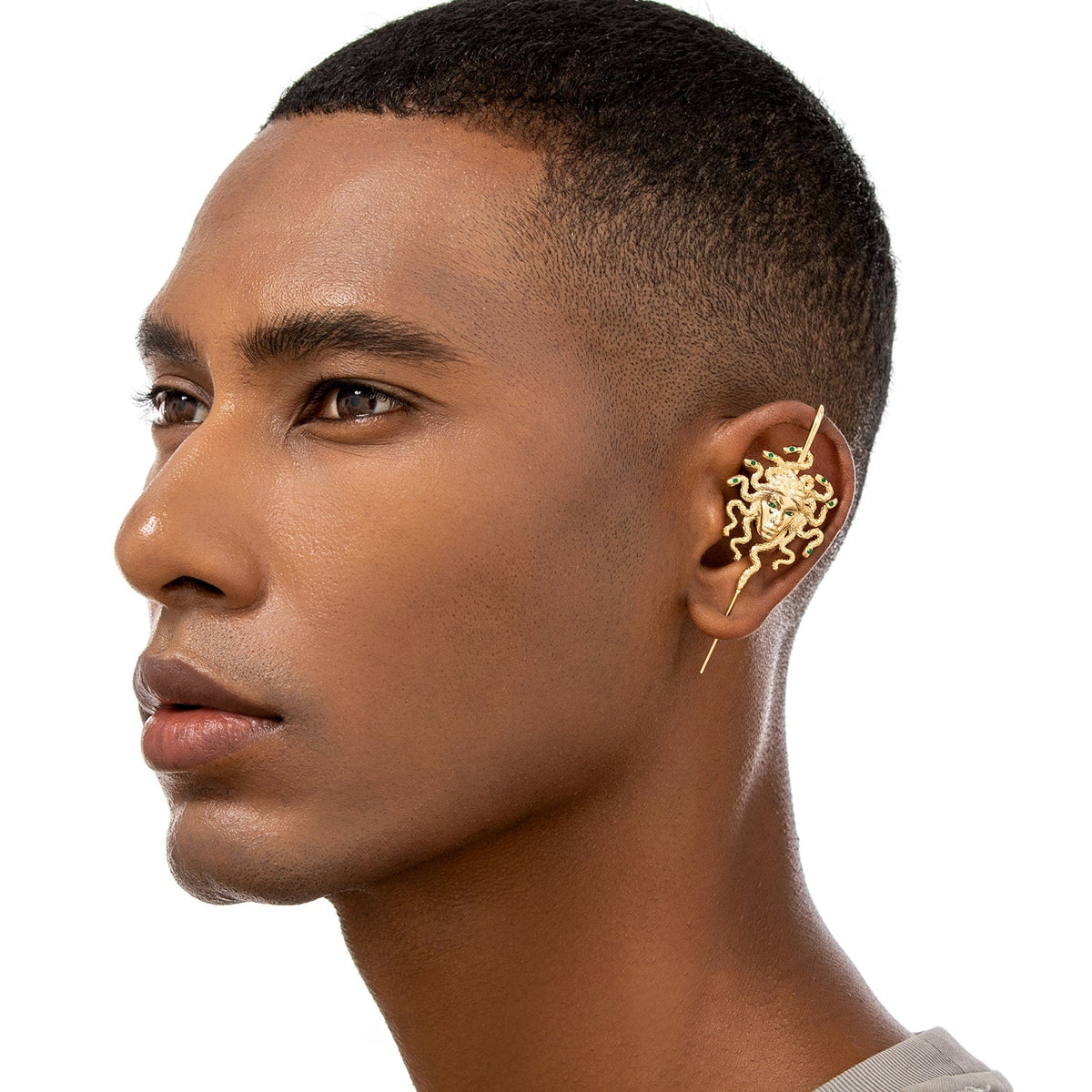 Medusa's Gaze ear cuff worn on the ear, profile view