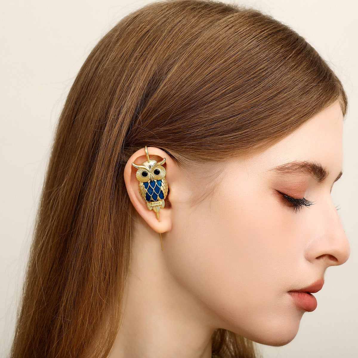 Night Owl ear cuff worn on the ear, profile view