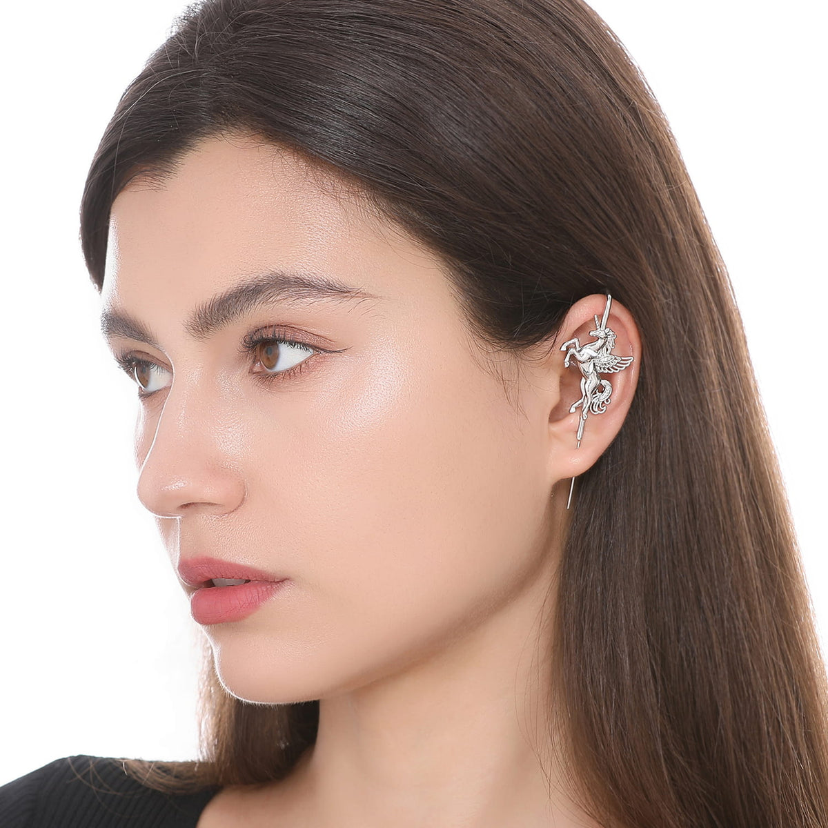 Pegacorn ear cuff worn on the ear, profile view