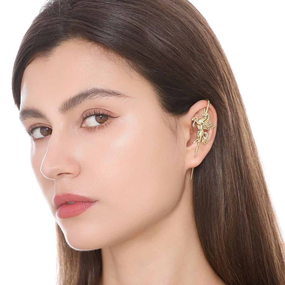 Pegacorn ear cuff worn on the ear, profile view