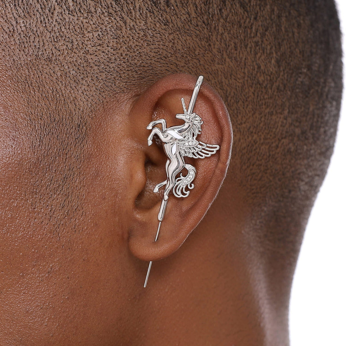 Pegacorn ear cuff worn on the ear, profile view