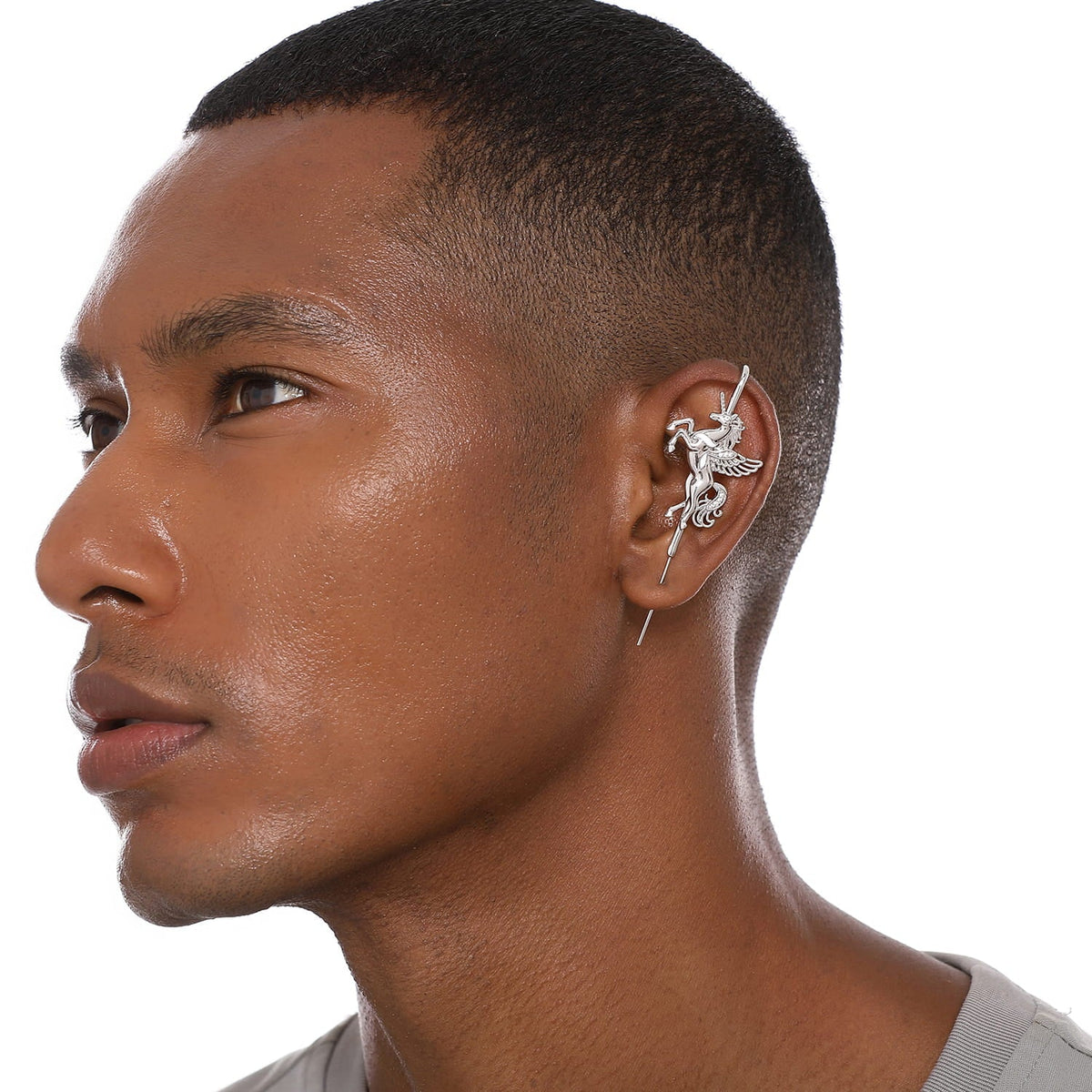 Pegacorn ear cuff worn on the ear, profile view