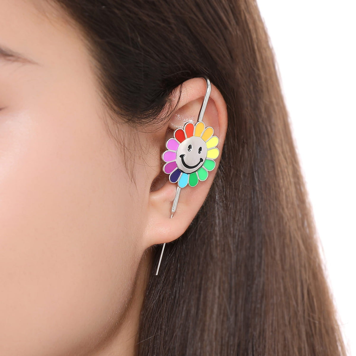 Rainbow Flower ear cuff worn on the ear, profile view