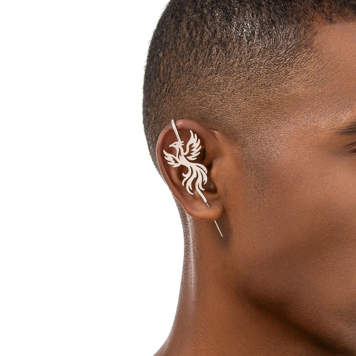 Rising Phoenix ear cuff worn on the ear, profile view