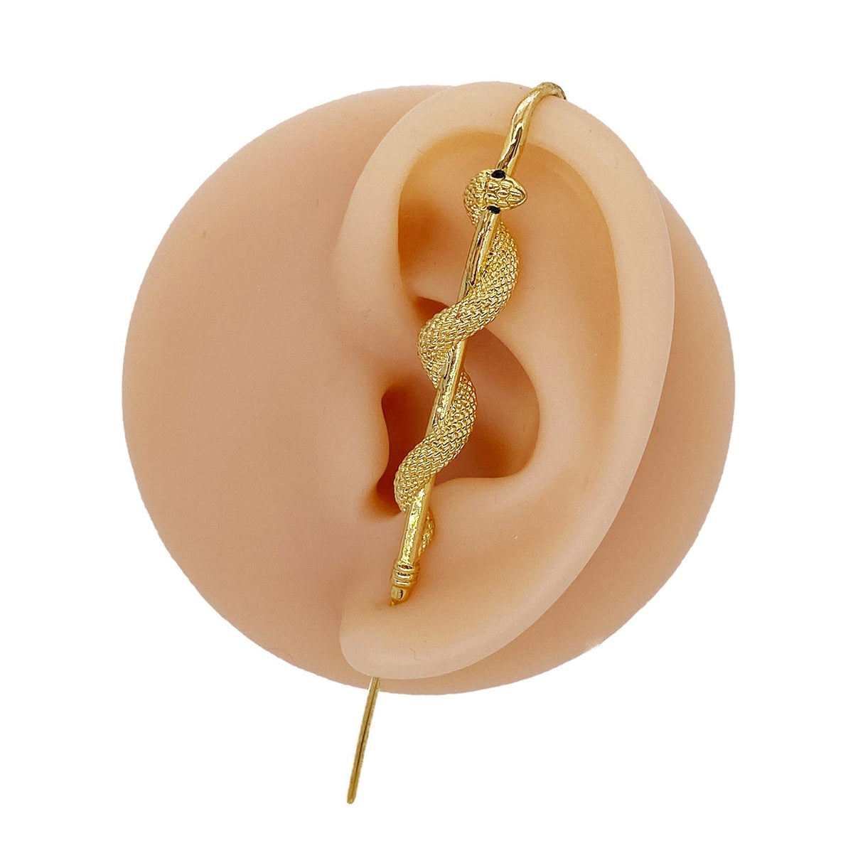 Coiled Snake ear cuff in gold on a black ear form