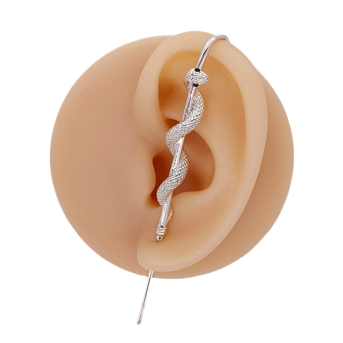 Coiled Snake ear cuff in silver on a black ear form