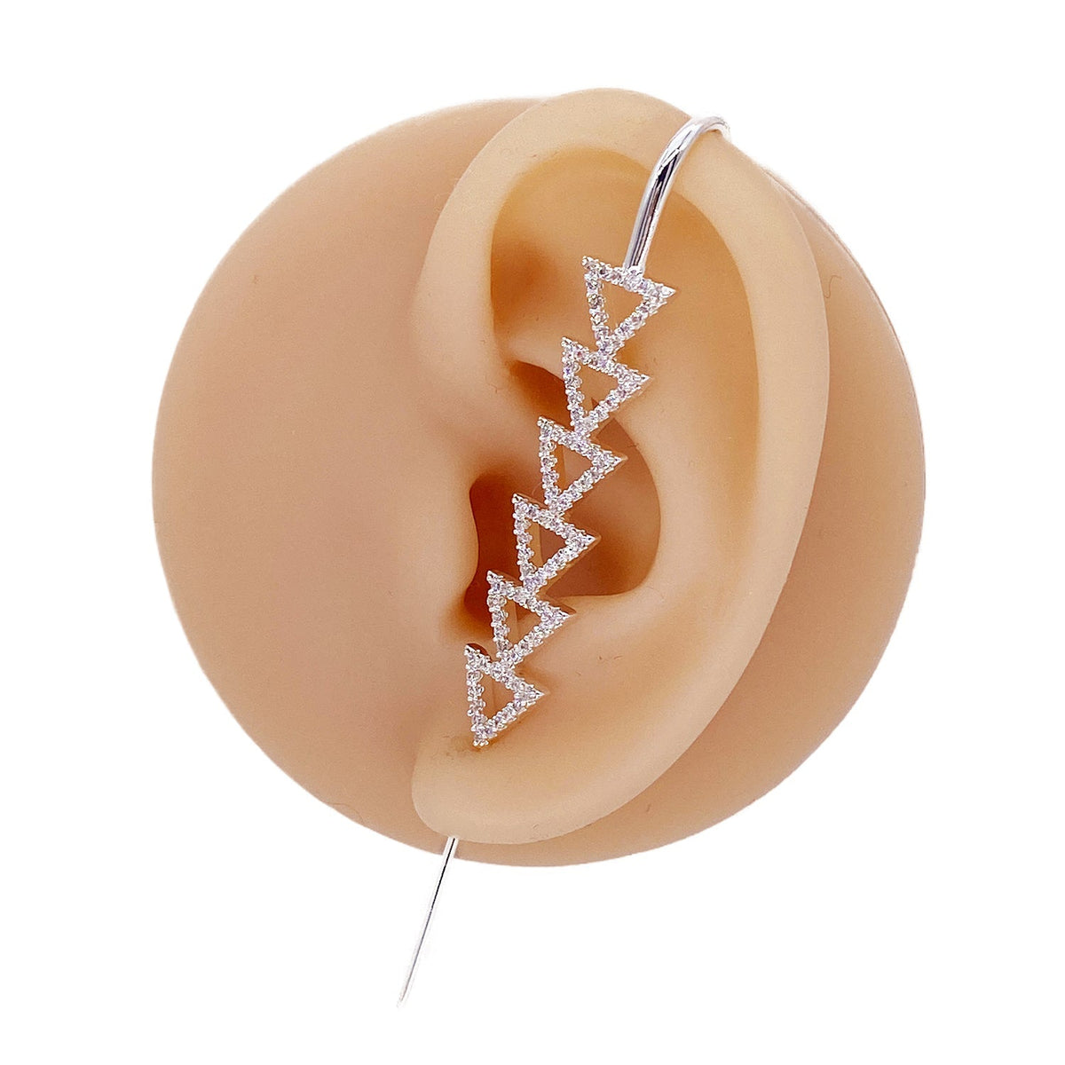 Triangle ear cuff in silver on a black ear form