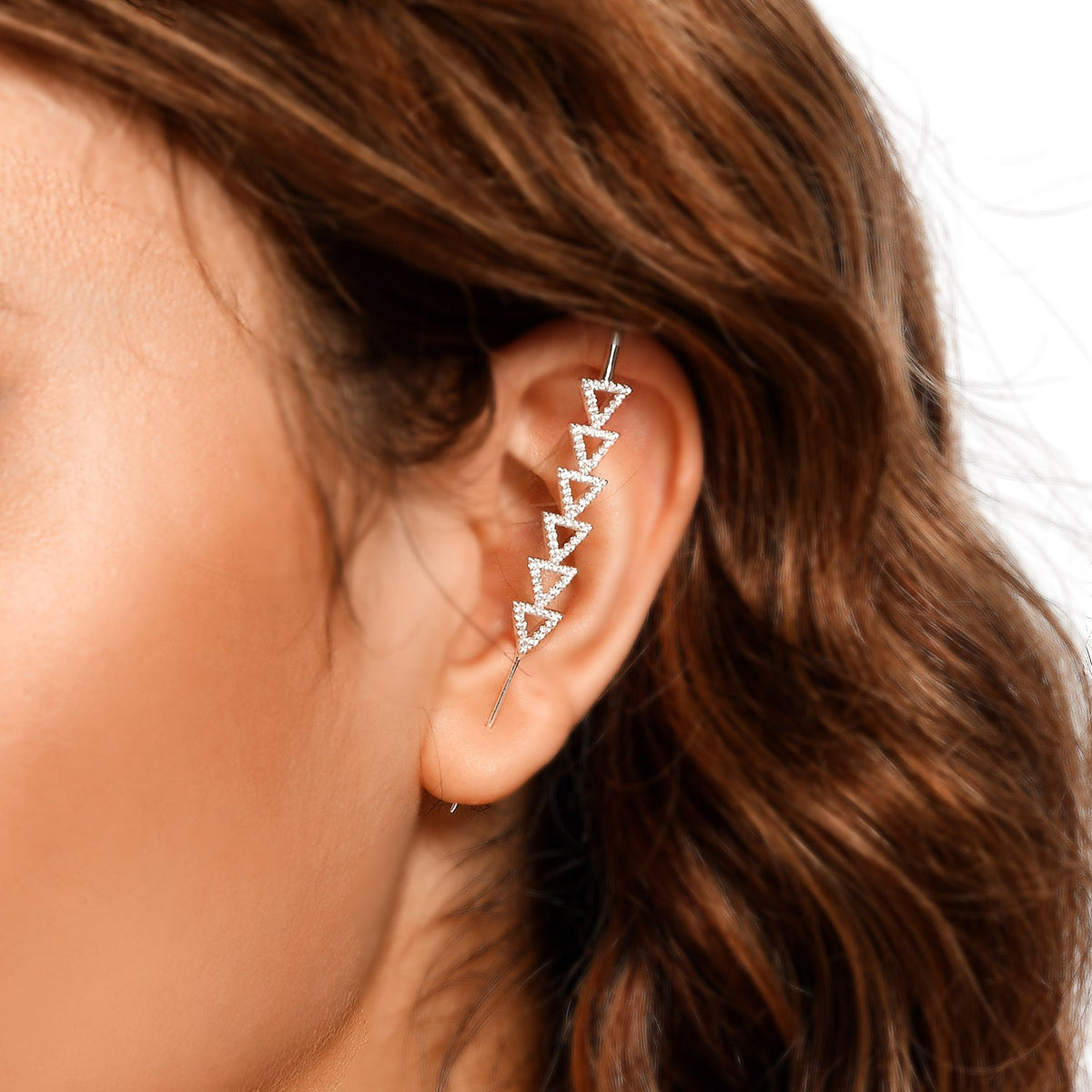 Triangle ear cuff in silver on a black ear form