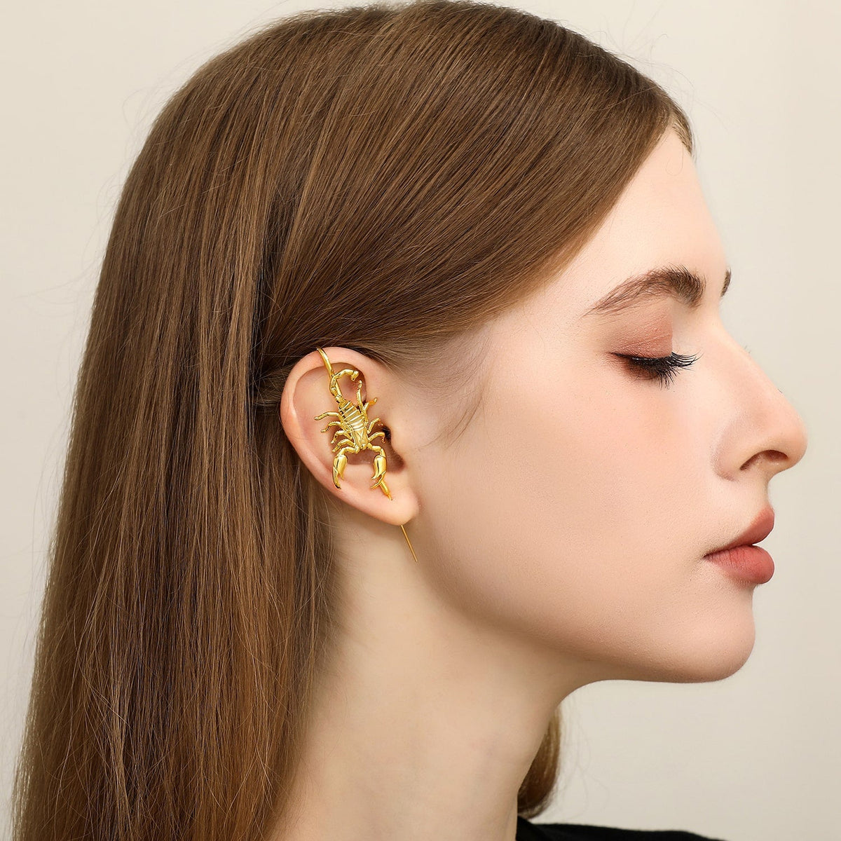 Fierce Scorpion ear cuff worn on the ear, profile view