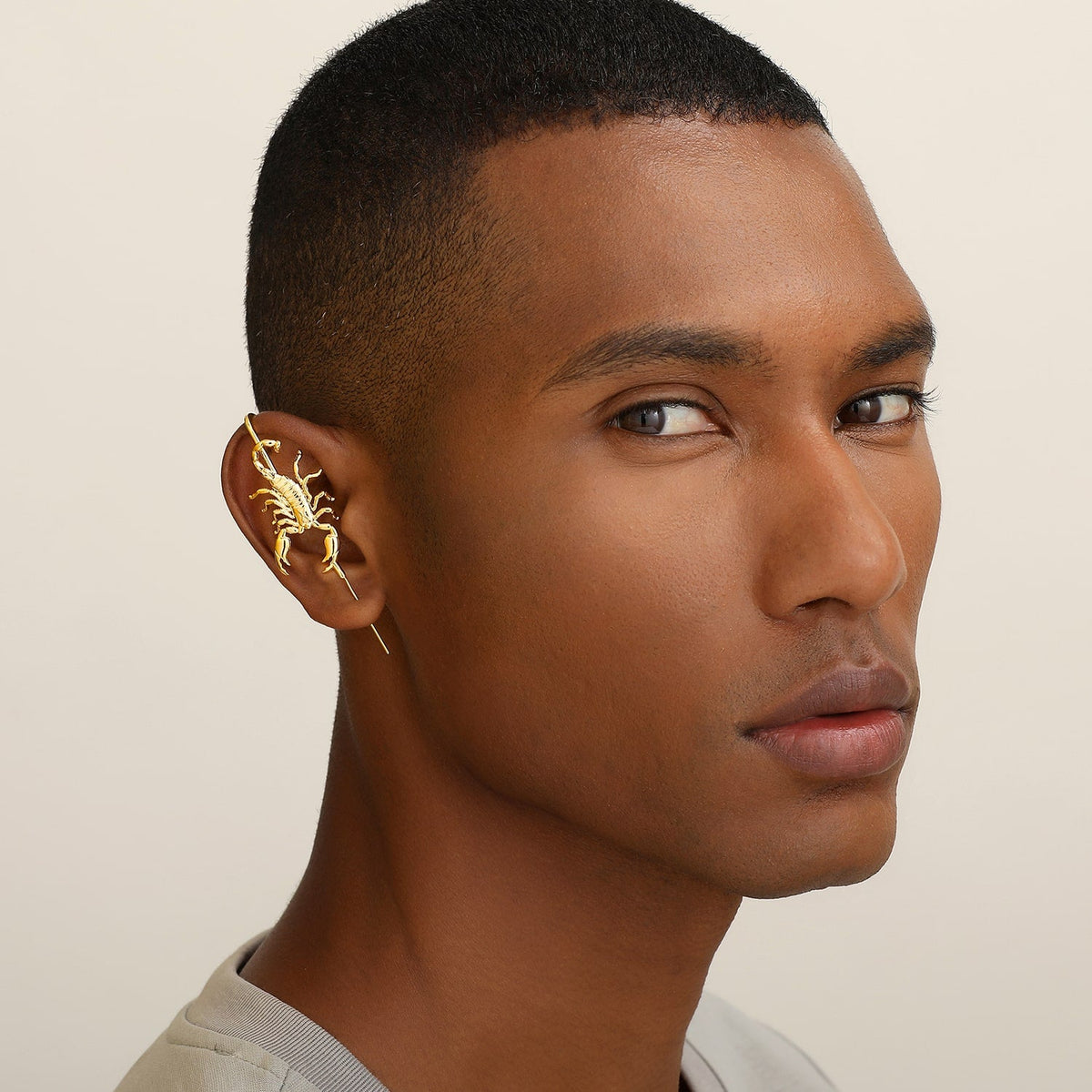 Fierce Scorpion ear cuff worn on the ear, profile view
