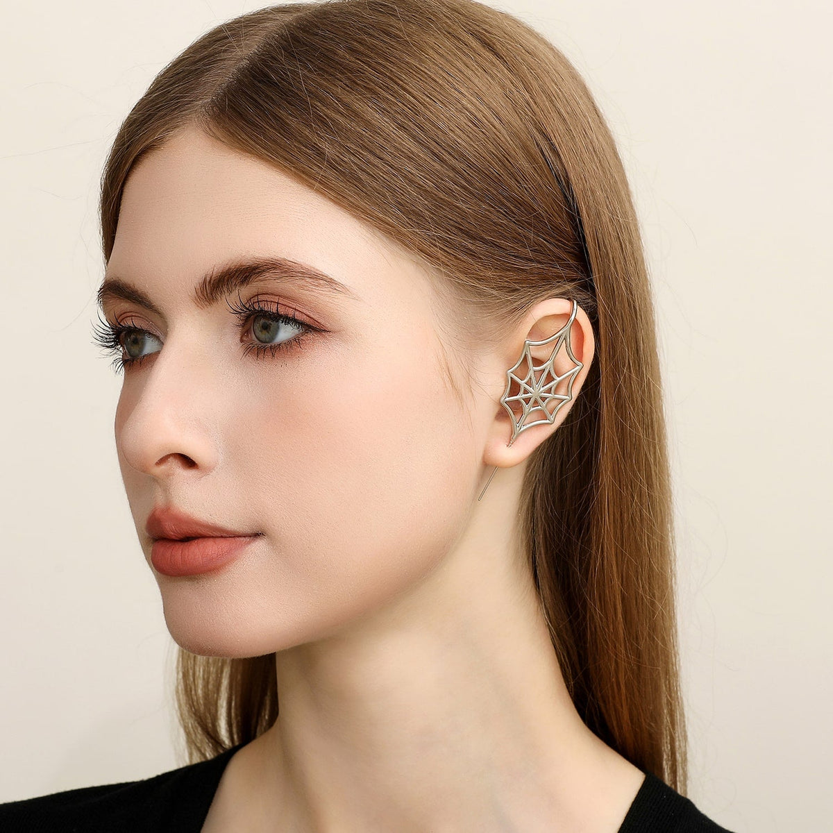 Silky Web ear cuff worn on the ear, profile view