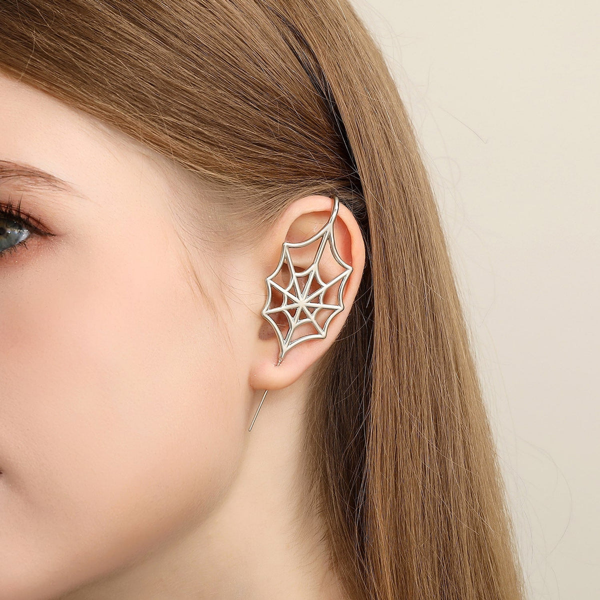 Silky Web ear cuff worn on the ear, profile view