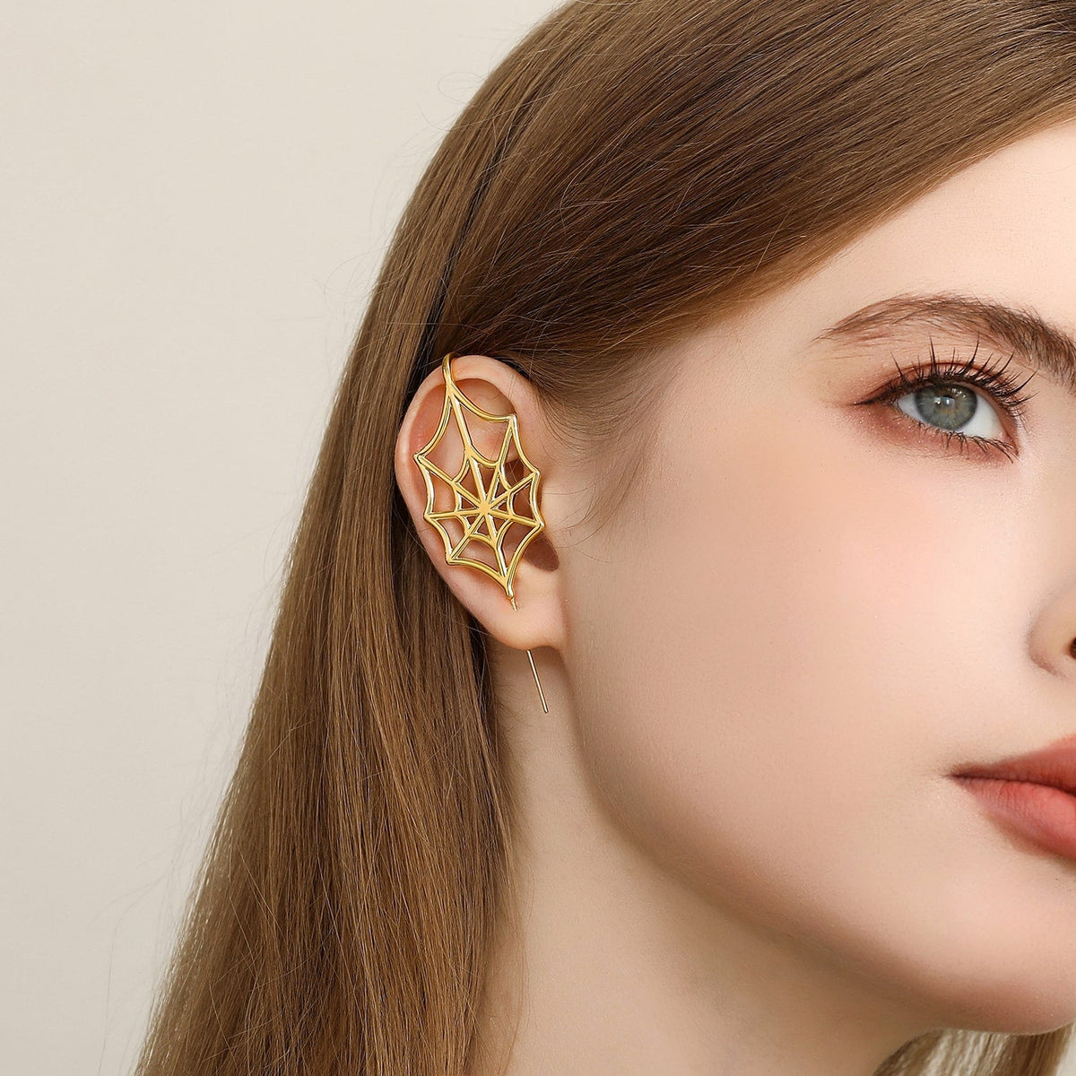 Silky Web ear cuff worn on the ear, profile view