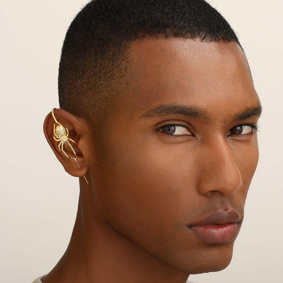 Arachnid Kiss ear cuff worn on the ear, profile view