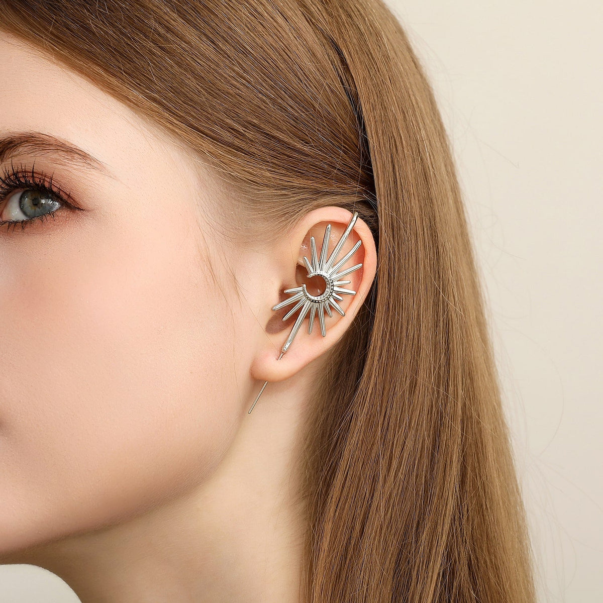 Sunray ear cuff worn on the ear, profile view