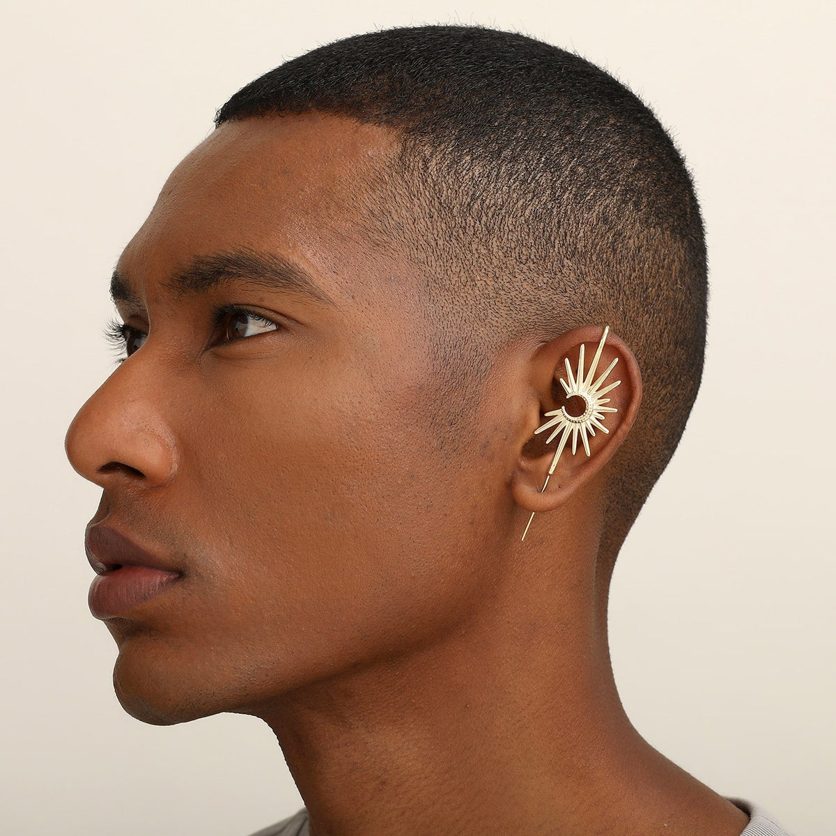 Sunray ear cuff worn on the ear, profile view