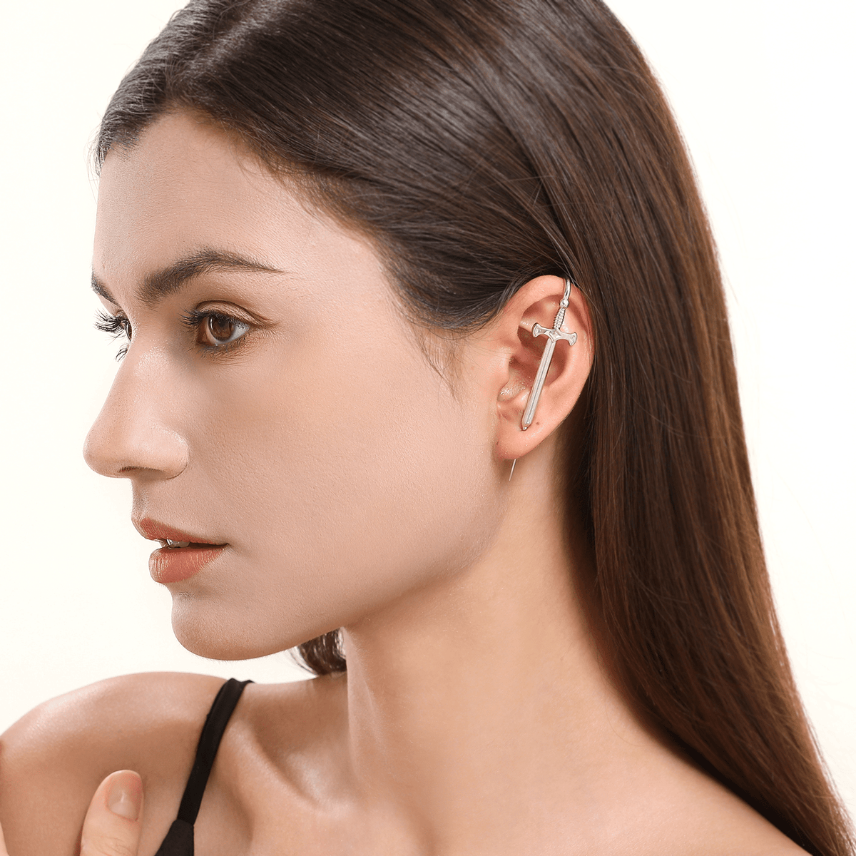 Titan's Edge ear cuff in silver worn on the ear, profile view