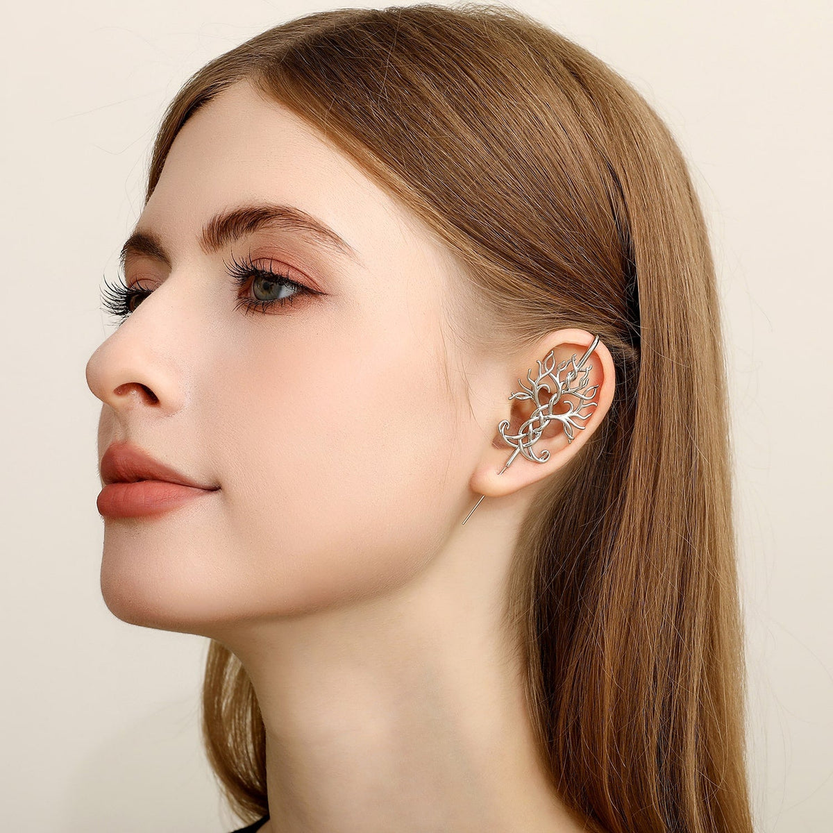 Tree of Life ear cuff worn on the ear, profile view