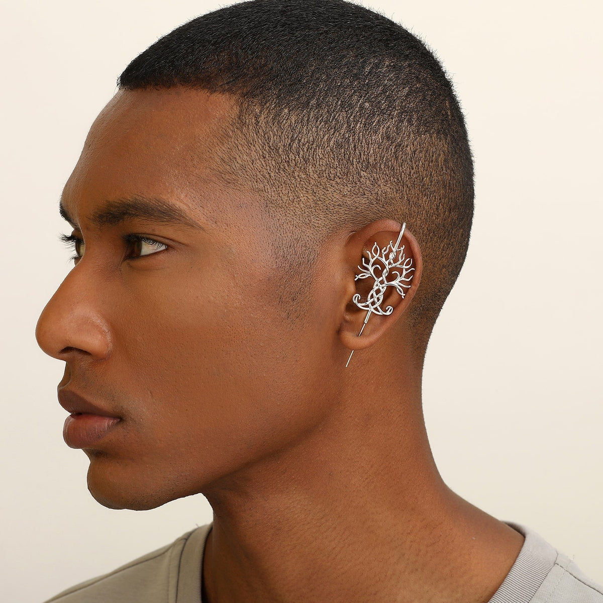 Tree of Life ear cuff worn on the ear, profile view