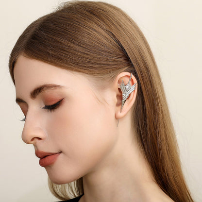Cosmic Wand ear cuff worn on the ear, profile view