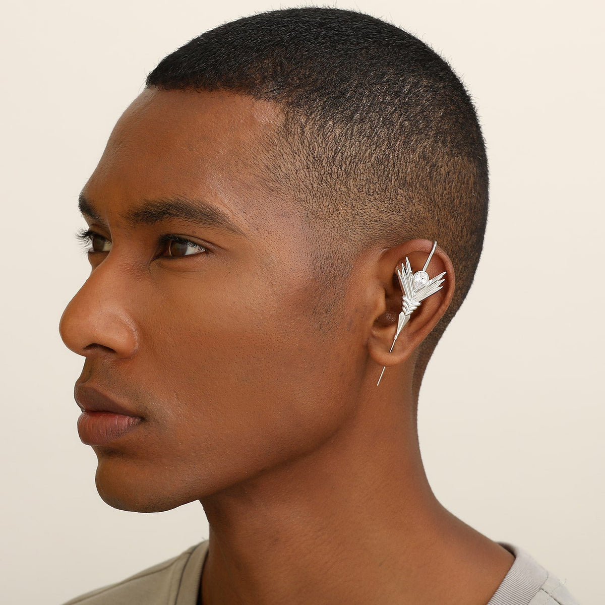 Cosmic Wand ear cuff worn on the ear, profile view