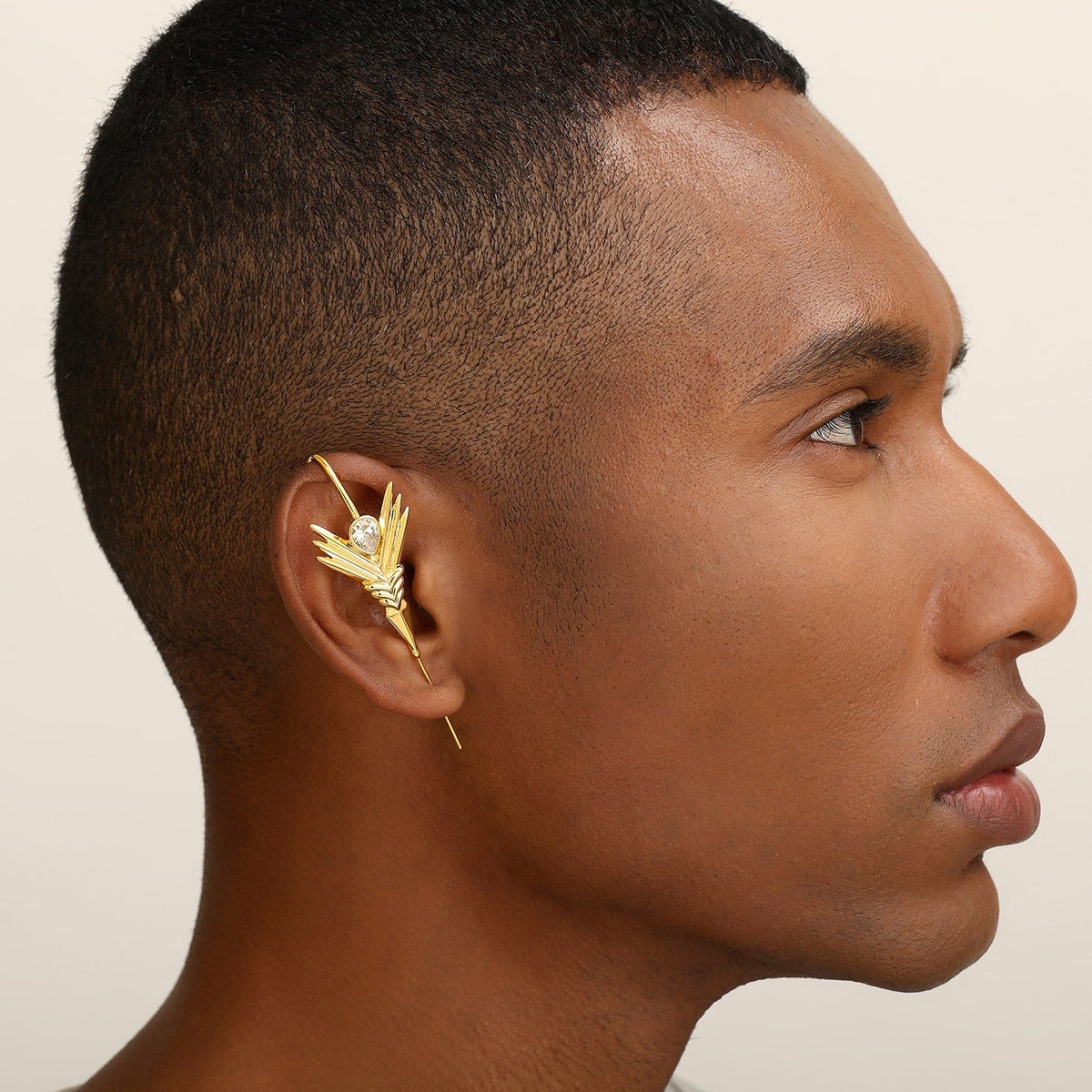 Cosmic Wand ear cuff worn on the ear, profile view